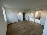 Foto - Kleine Erdgeschoßwohnung als Erstbezug