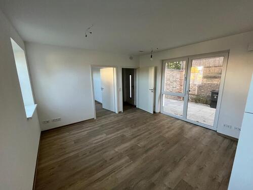 Foto - Kleine Erdgeschoßwohnung als Erstbezug