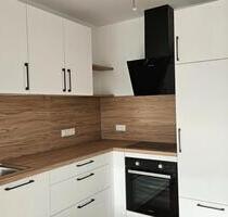 Böen: Moderne Erdgeschosswohnung mit 2 ZKB, EBK! Terrasse! PKW-Stellplatz! - Löningen