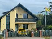 Foto - Einfamilienhaus mit Einliegerwohnung