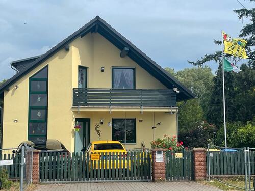 Foto - Einfamilienhaus mit Einliegerwohnung