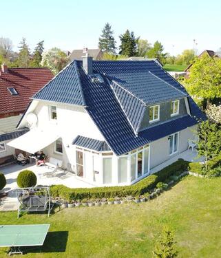 Foto - Einfamilienhaus mit Einliegerwohnung