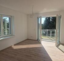 KfW 40: Helle Wohnung mit Süd-Westbalkon in Spenge-Lenzinghausen