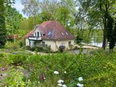 Foto - Exklusives Wassergrundstück mit privatem Seezugang & Bootsanleger