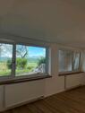 Foto - 1 Zimmer Souterrainwohnung mit überdachter Terrasse und Bergblick