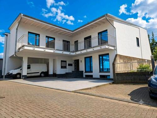 Foto - Modernes Mehrfamilienhaus mit 3 Wohneinheiten