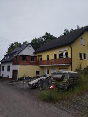 Foto - Zwei Wohnhäuser + Baugrundstück mit Doopelgarage