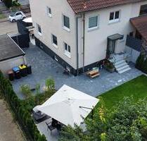 Moderne Doppelhaushälfte mit zwei Terrassen und gepflegtem Garten - Senden