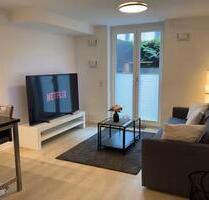 Möblierte Neubauwohnung mit Tiefgaragenstellplatz + Terrasse - Kiel