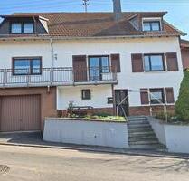 Einfamilienhaus mit Potenzial & Hanggrundstück in Monzingen