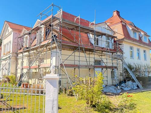 Foto - 3,5 4,5 Zimmer Wohnung im Gutshaus mit Ofenheizung und Garten