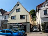 Foto - Geschäfts- und Zweifamilienhaus in zentraler Lage
