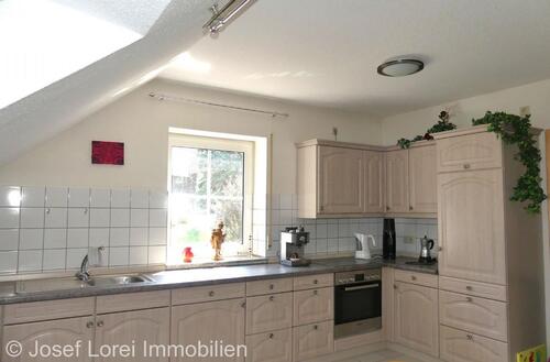 Foto - DG-Wohnung mit Wanne, Dusche u. EBK in ruhiger Ortsrandlage