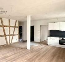 Charmante 3,5-Zimmer Hochparterre-Wohnung mit Terrasse & Fachwerkflair im kernsanierten Denkmal - Forchtenberg