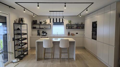 Foto - Luxuriöse 3,5 Zimmer Erdgeschosswohnung mit Garten