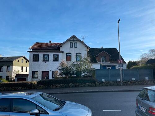 Foto - Zweifamilienhaus und ein Einfamilienhaus