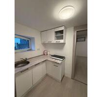 2-Zimmer-Souterrainwohnung mit Einbauküche – sofort bezugsfrei in Rinderbügen - Büdingen