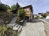 Foto - Einfamilienhaus mit Wintergarten, Garten und Garage