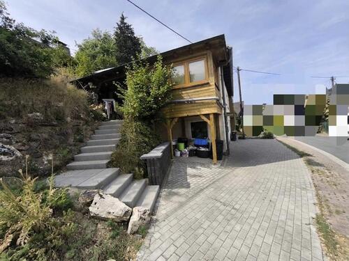 Foto - Einfamilienhaus mit Wintergarten, Garten und Garage