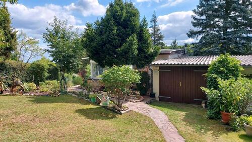 Foto - Wunderschön Gartengrundstück mit Außensauna, Wintergarten, Garage