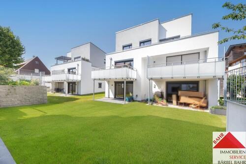 Foto - Moderne 3-Zimmer-Wohnung mit großem Balkon und offenem Wohn-Essbereich