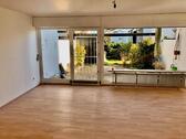 Foto - Helle Wohnung mit großem Hobbyraum, Terrasse und Privatgarten