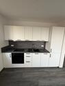 Foto - Charmante 2-Zimmer-Obergeschosswohnung mit moderner Einbauküche