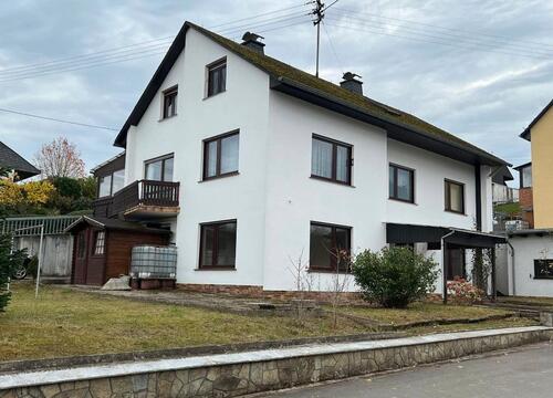Foto - Einfamilienhaus mit Einliegerwohnung