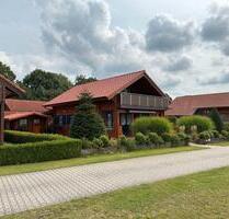 Einfamilienhaus mit Carport in 1. Reihe mit Seeblick - Walchum