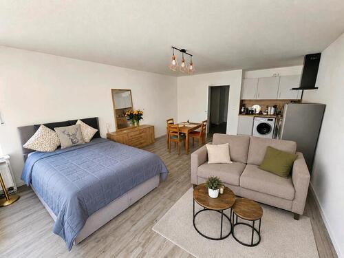 Foto - Modern möblierte 1-Zi.-Wohnung mit TG-Platz