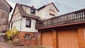 Foto - Einfamilienhaus (sanierungsbedürftig) mit 2 Garagen zu verkaufen
