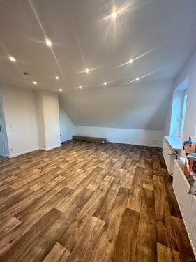 Foto - 3 Zimmer Dachgeschoßwohnung in Brande-Hörnerkirchen