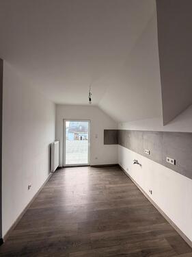 Foto - Dachgeschoßwohnung in Osthofen zur Miete