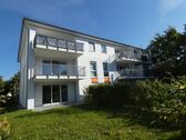 Foto - Modern geschnittene 3-Zimmer-Erdgeschoss-Wohnung mit Einbauküche und Garten