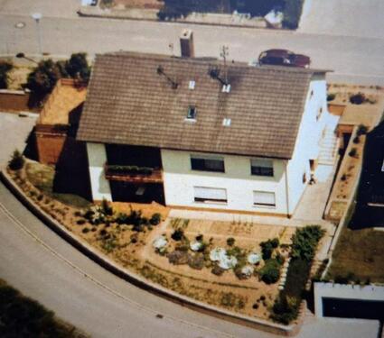 Foto - freistehendes Einfamilienhaus mit vermieteter Einliegerwohnung