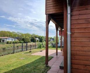 Top gepflegtes Holz Ferienwohnhaus demächst wegen Umzug - Walchum