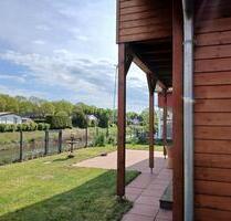 Top gepflegtes Holz Ferienwohnhaus demächst wegen Umzug - Walchum