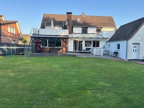Foto - 8 Zimmer Mehrfamilienhaus, Wohnhaus zum Kaufen in Syke