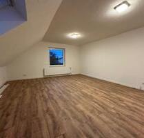 Weyhausen - Modernisierte 4-Zimmer Wohnung im DG eines Zweifamilienhauses