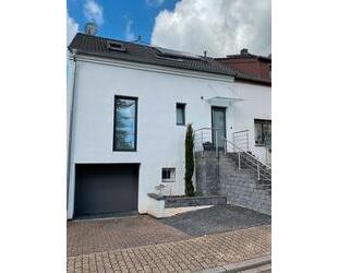 Einfamilienhaus, einseitig angebaut - Bous
