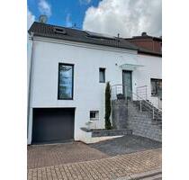 Einfamilienhaus, einseitig angebaut - Bous