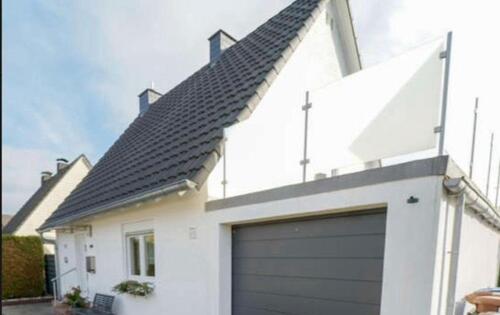 Foto - Freistehendes Einfamilienhaus mit Dachterrasse