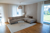 Wohnbereich - Moderne Erdgeschosswohnung mit Sauna & Garten