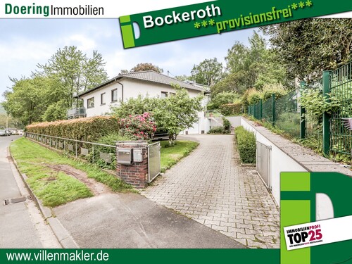 Außenansicht / Zufahrt - Gepflegtes Wohnhaus mit ebenerdiger Einliegerwohnung und Garten