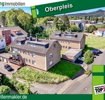 Oberpleis: 2 Mehrfamilienhäuser mit insg. 12 Wohnungen und 8 Garagen - Königswinter