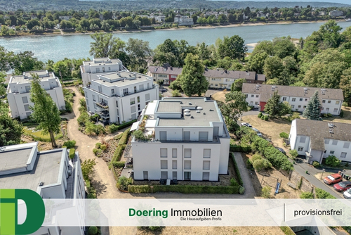 Luftbild - Moderne 3-Zimmer-Wohnung mit eigenem Garten direkt am Rhein!