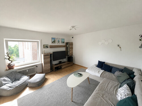 Wohnzimmer - Flexible 3- bis 4-Zimmer-Wohnung mit Balkon in Bad Honnef