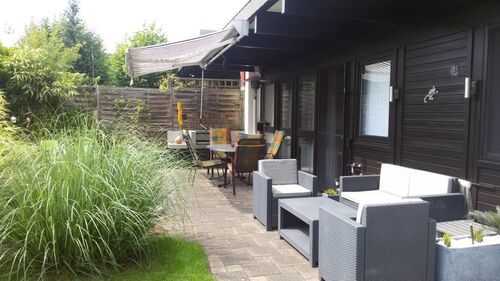 Terrassenansicht - Voll möbliertes Einfamilienhaus mit All-inclusive-Warmmiete