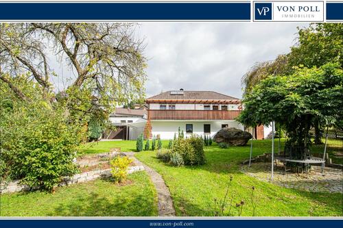 Aussenansicht - Familienfreundliches Einfamilienhaus mit offenem Wintergarten und herrlicher Gartenanlage