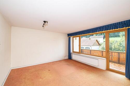 OG_Wohnzimmer_mit_Zugang_Balkon (1) - 